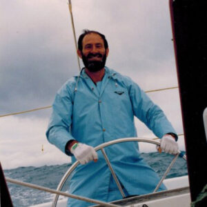 John Glennie at the helm of Rose-Noelle acoss Tasman Sea